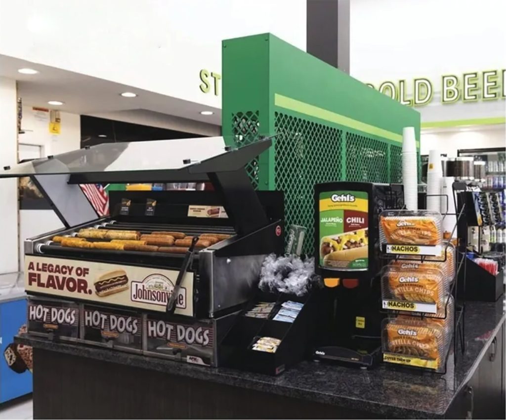 Commercial roller grill with raised sneeze guard for easier cleaning and employee access